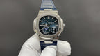 Patek Philippe watch, front display with black dial and blue leather strap.