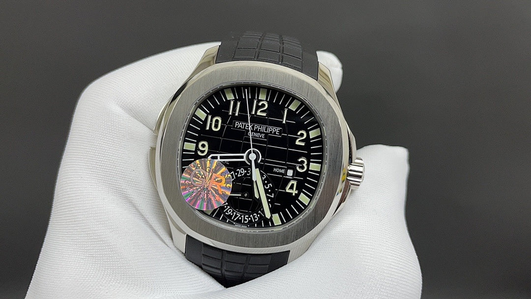 Patek Philippe watch with black dial and gray strap, close-up