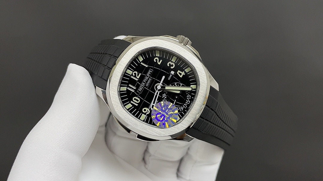 Patek Philippe watch with black dial, rainbow reflection, steel case, gray strap