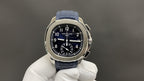 Patek Philippe blue-dial wristwatch with stainless bezel and blue strap