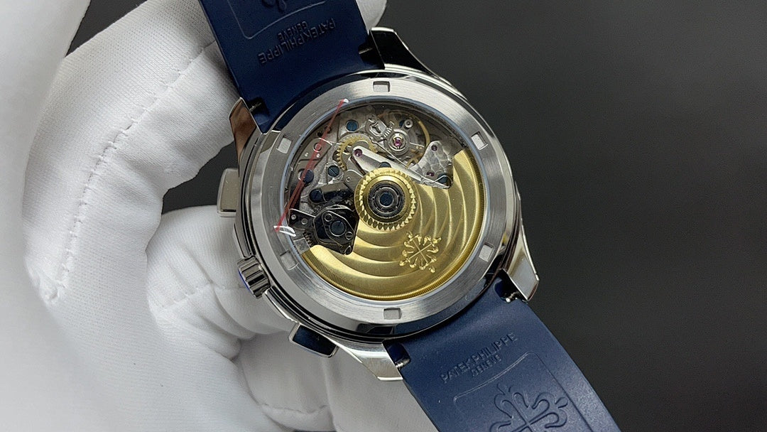 Patek Philippe watch case back with visible movement on blue strap