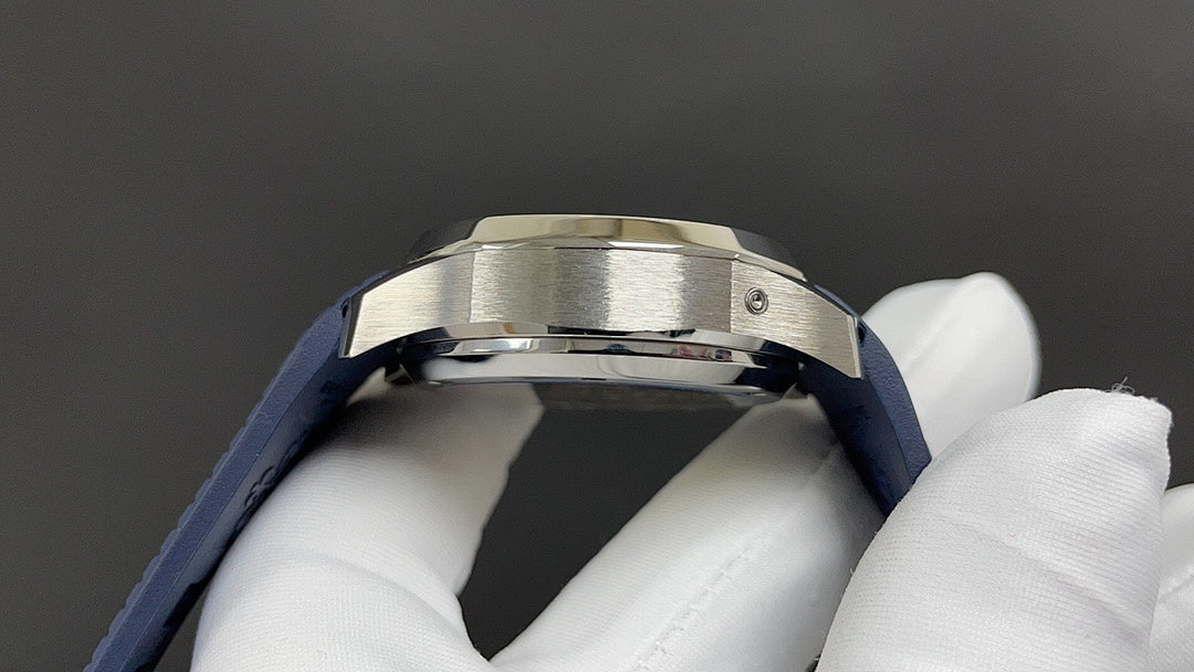 Patek Philippe wristwatch with stainless case bezel and blue strap, side profile