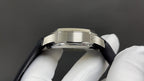 Patek Philippe watch case profile with black strap and silver bezel