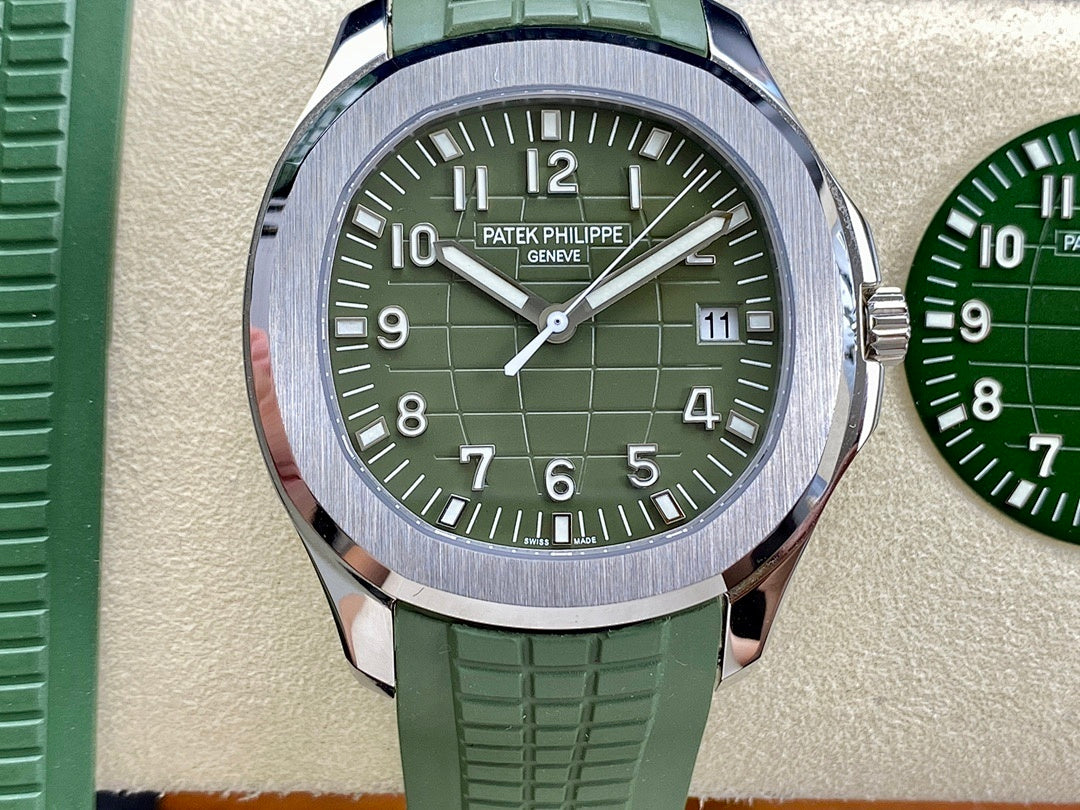Green dial Patek Philippe wristwatch with silver case and green rubber strap