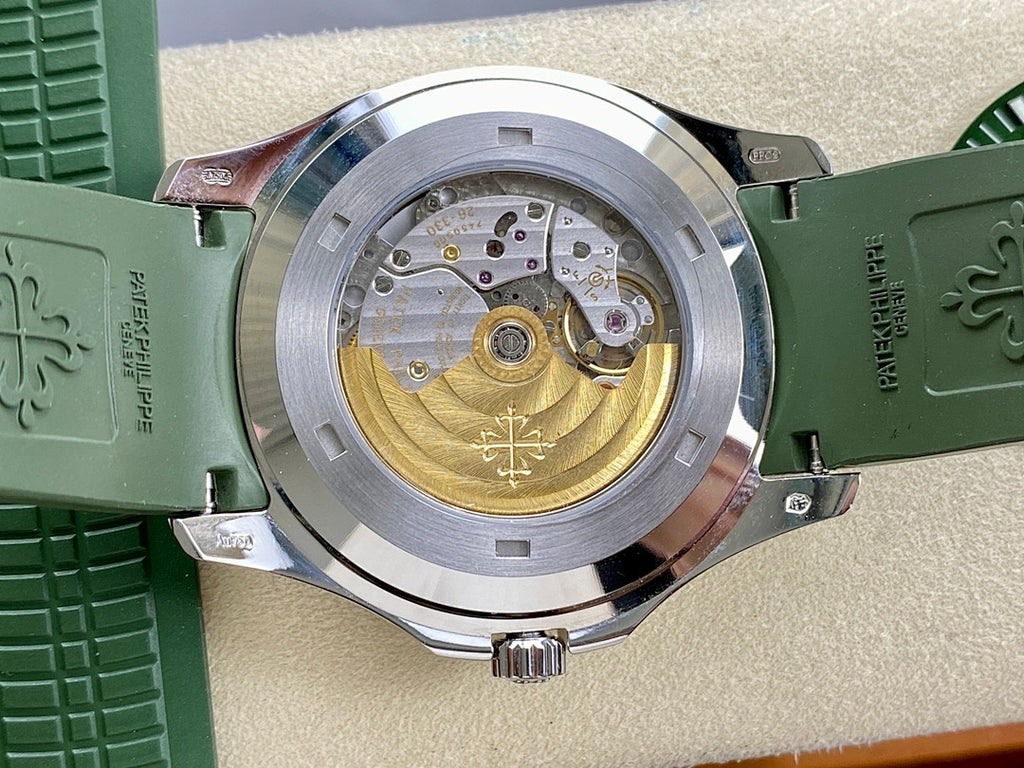 Watch with open caseback showing mechanical movement beneath clear cover
