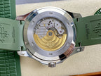 Watch with open caseback showing mechanical movement beneath clear cover