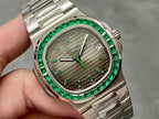 Patek Philippe wristwatch close-up: green bezel, gray textured dial, and silver hands