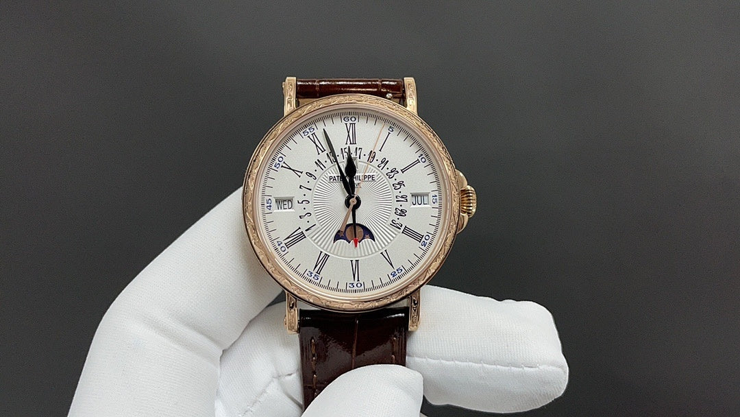 Patek Philippe watch front view with white dial, gold case, and brown leather strap.