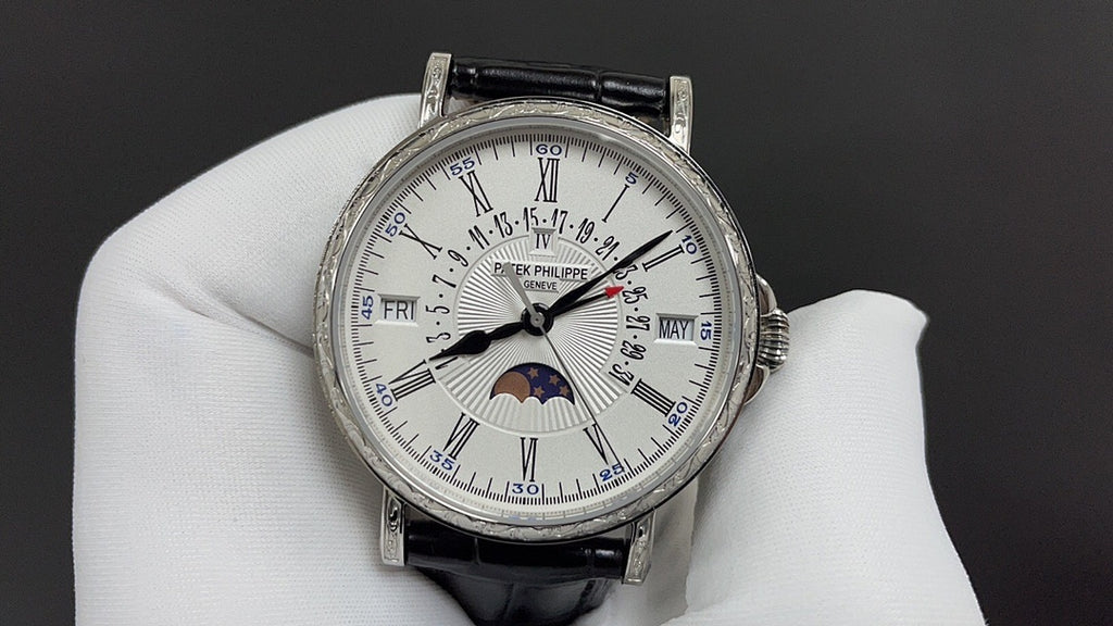 Patek Philippe wristwatch with white dial, date window, black leather strap