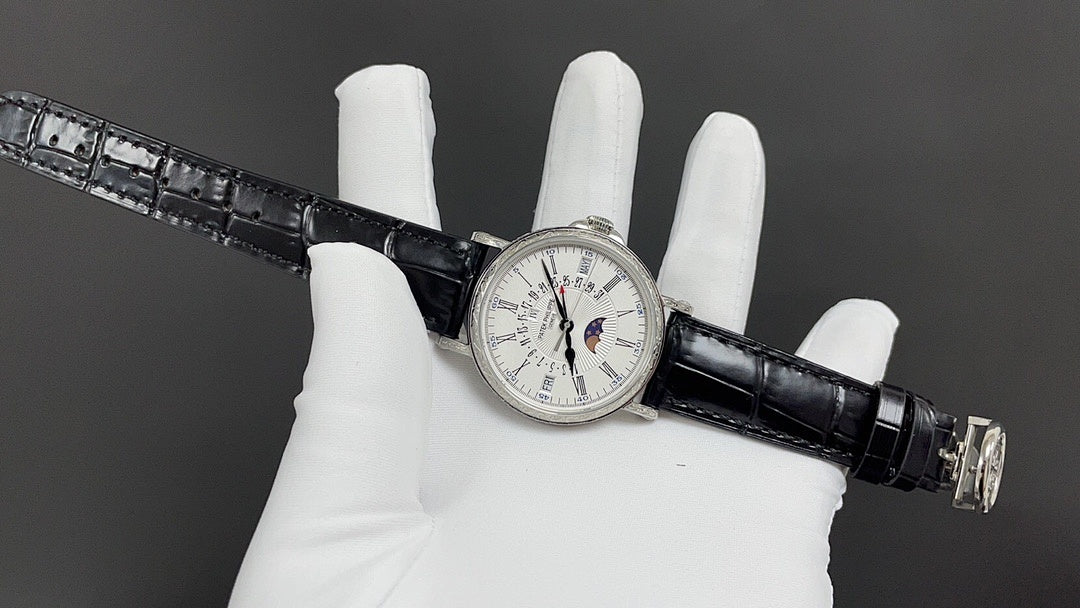Patek Philippe wristwatch full view, white dial with multiple subdials, black leather strap
