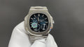 Silver wristwatch with black dial, multi-subdial layout, on metal bracelet, clasp visible