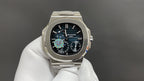 Silver wristwatch with black dial, multi-subdial layout, on metal bracelet, clasp visible