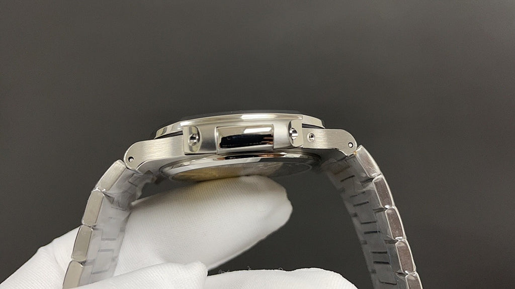 Steel wristwatch case back with brushed finish and integrated bracelet links