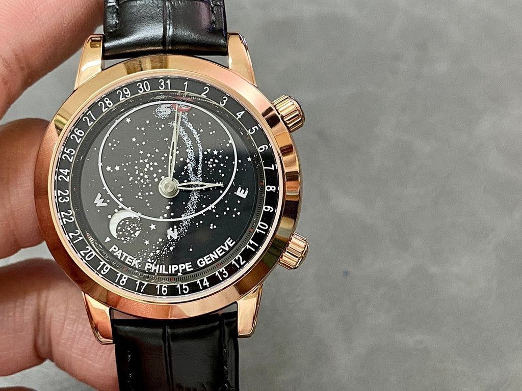 Luxury wristwatch with black starry dial, rose-gold bezel, and black leather strap