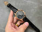 Luxury wristwatch on black leather strap with starry dark dial and rose-gold bezel