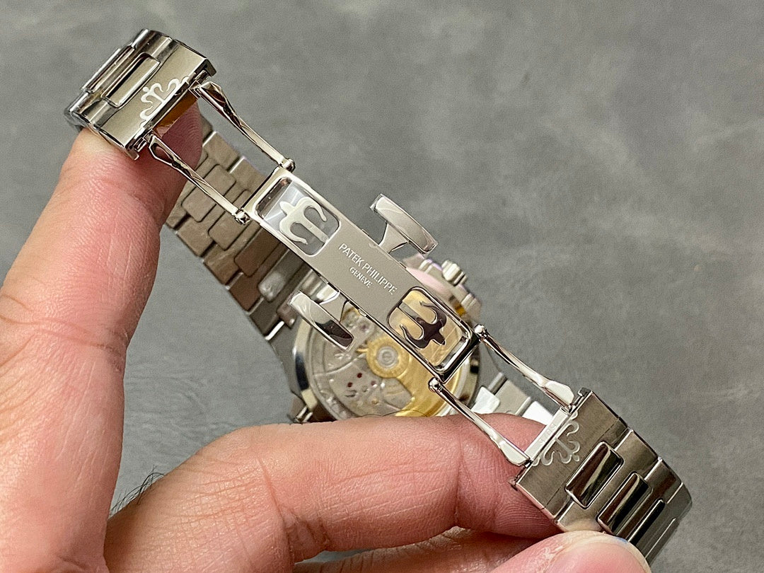 Patek Philippe watch case and bracelet underside with clasp hardware
