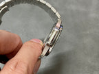 Patek Philippe watch clasp and links close-up on metal bracelet