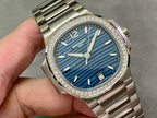 Patek Philippe wristwatch close-up, blue dial with diamond bezel and hour markers