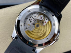 Patek Philippe watch caseback with exposed movement and gold-toned rotor.