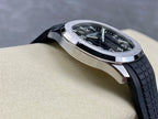Patek Philippe wristwatch side profile with black rubber strap and silver case.