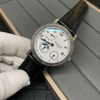 Patek Philippe watch with white dial, Roman numerals, black leather strap