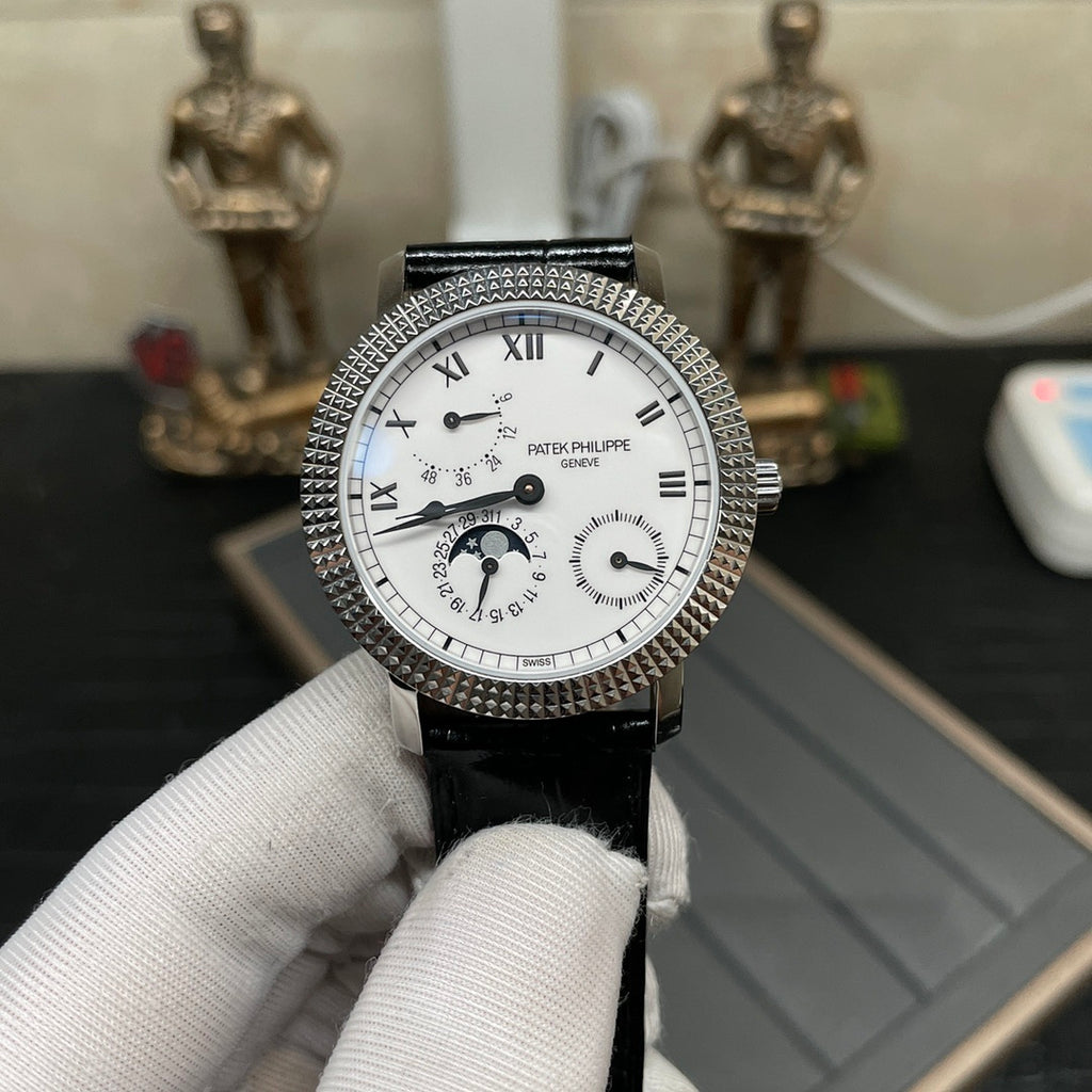 Patek Philippe watch front with white dial, subdials, and black leather strap