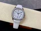 Diamond bezel watch with white dial and white textured rubber strap, on display