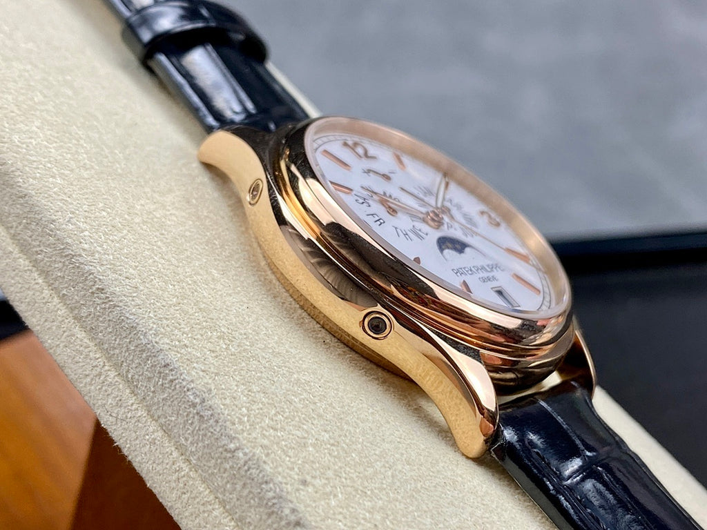 Patek Philippe watch rear side view with crown and black leather strap