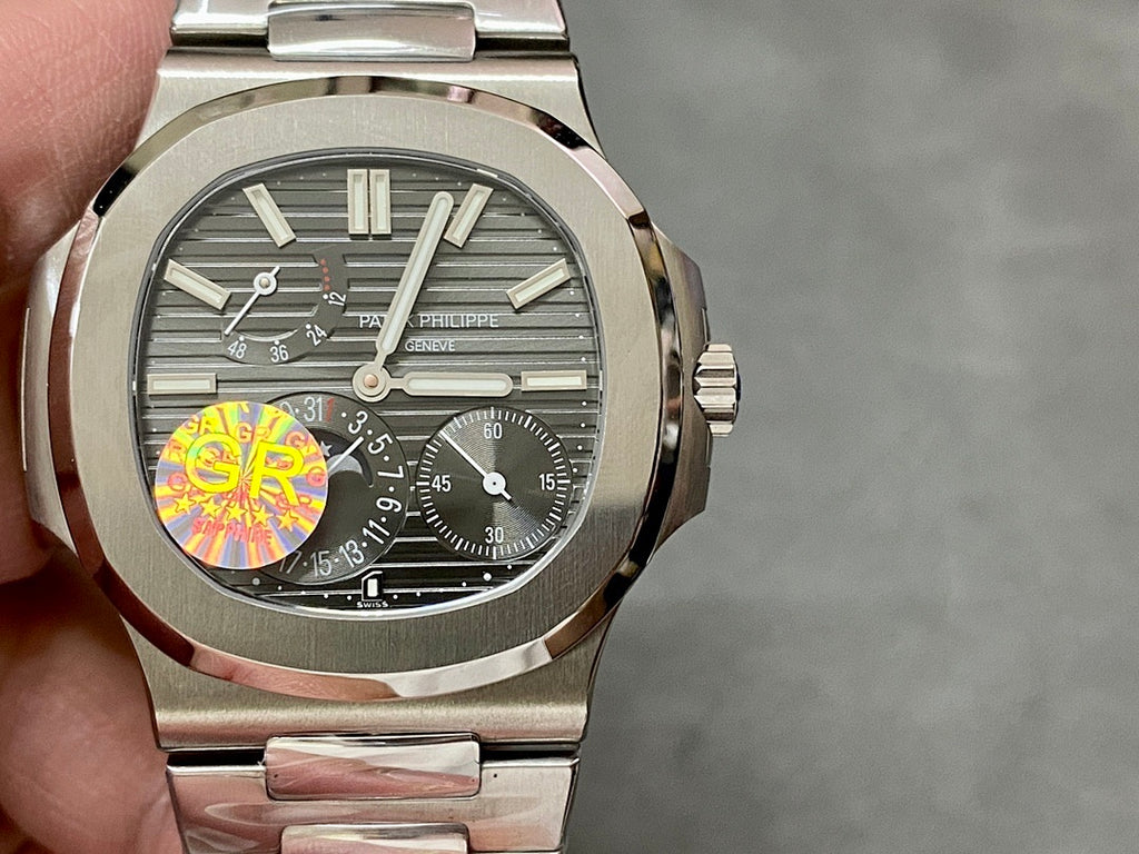 Stainless steel wristwatch, gray textured dial with multiple subdials and silver hands