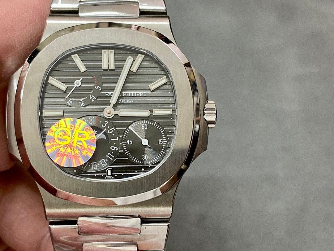 Stainless steel wristwatch, gray textured dial with multiple subdials and silver hands