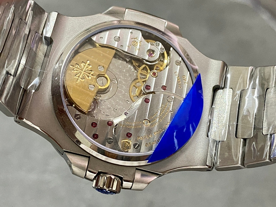 Stainless steel watch caseback with exposed movement details