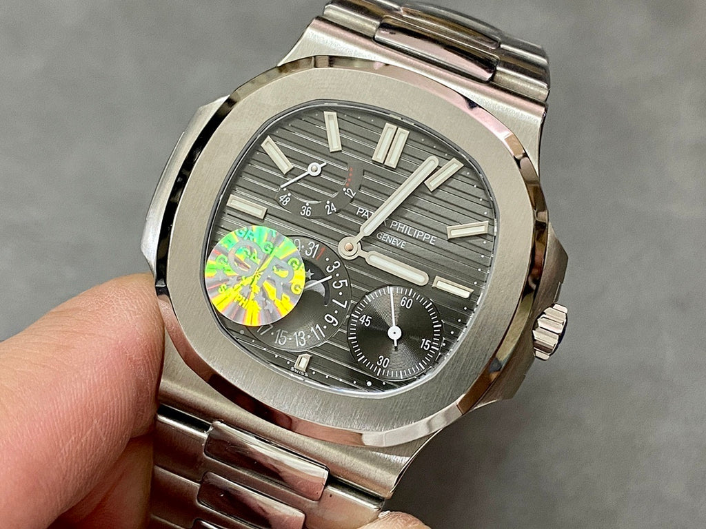 Patek Philippe stainless steel wristwatch with gray striped dial and black subdials