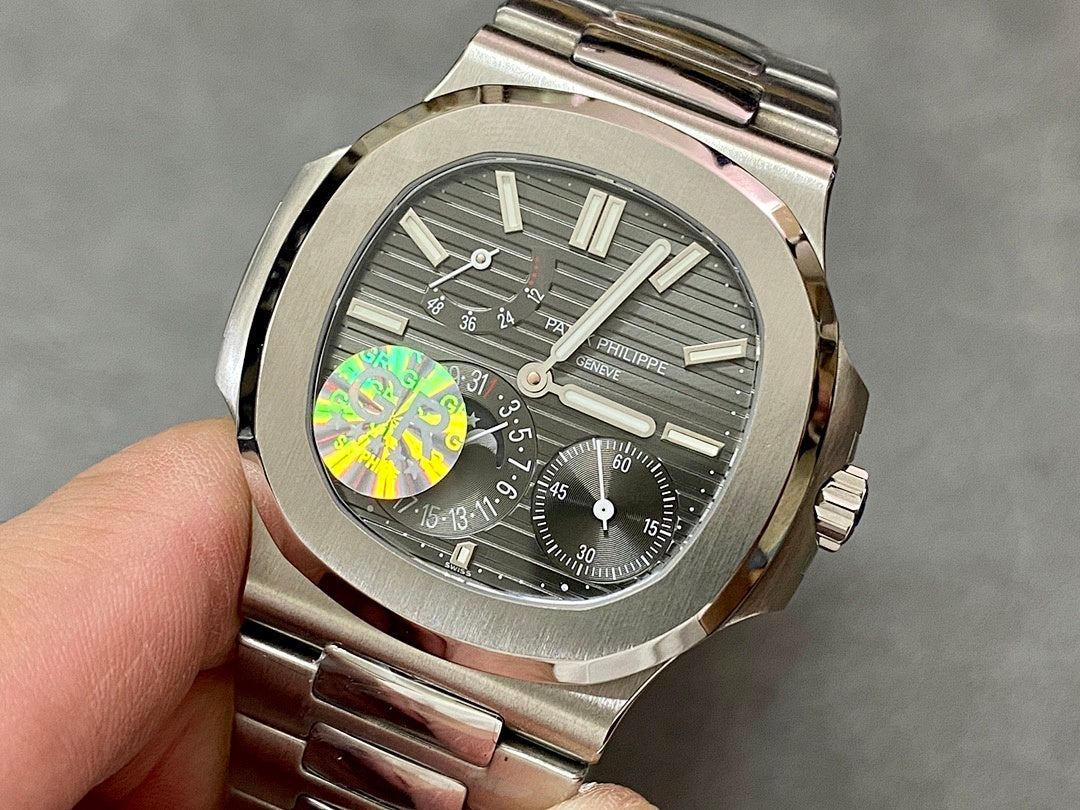 Patek Philippe stainless steel wristwatch with gray striped dial and black subdials
