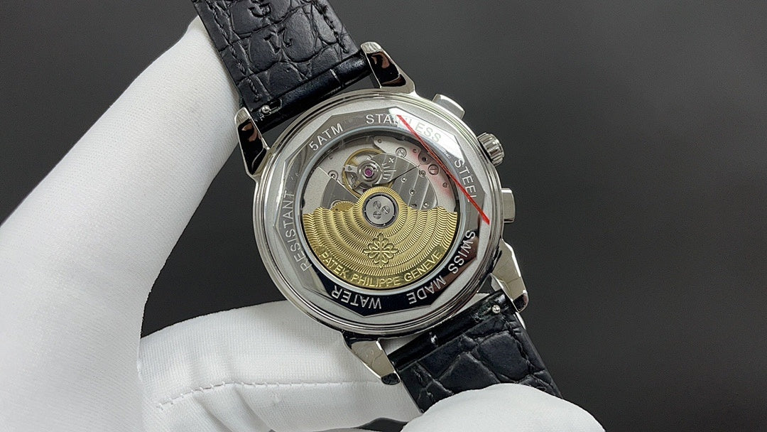 Patek Philippe watch caseback with see-through movement and black leather strap