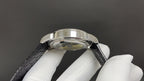 Patek Philippe watch caseback side view with black leather strap