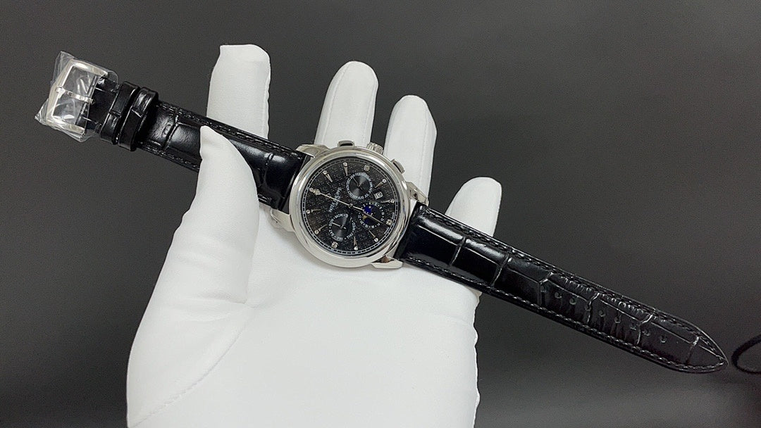 Patek Philippe watch angled view with black leather strap and buckle