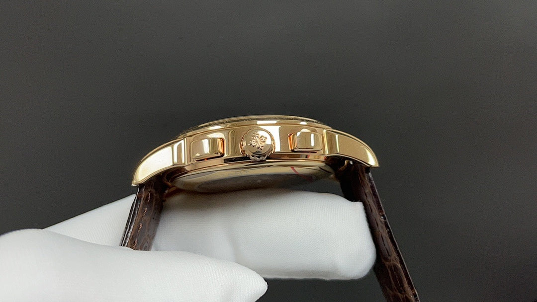 Patek Philippe wristwatch bezel close-up, gold case, brown leather strap