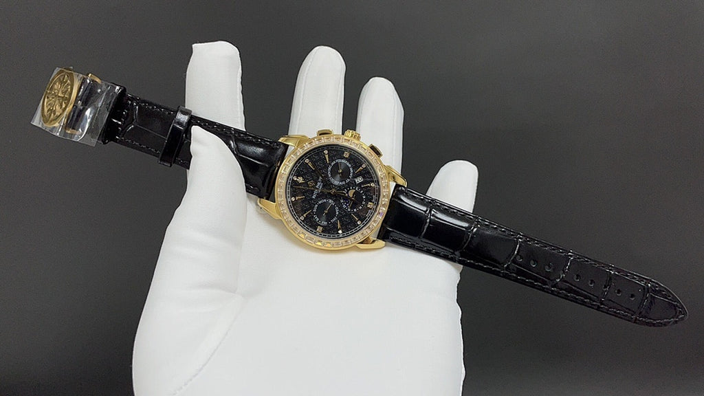 Patek Philippe wristwatch angled view on black leather strap with gold case