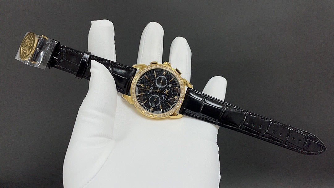 Patek Philippe wristwatch angled view on black leather strap with gold case