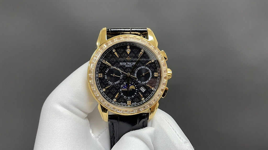 Patek Philippe wristwatch dial view with gold case and black leather strap