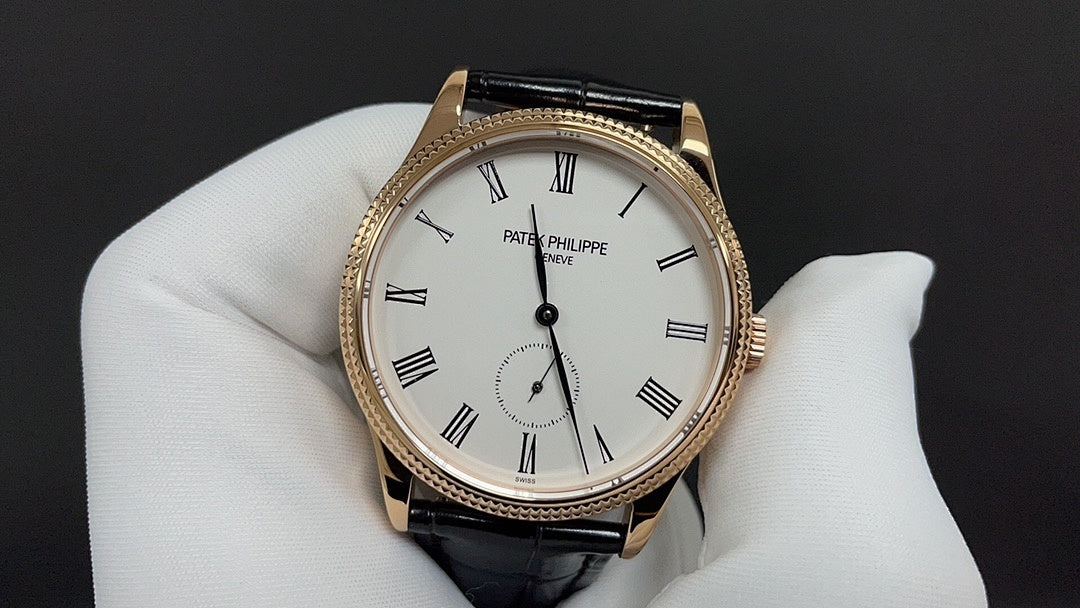 Patek Philippe wristwatch white dial with black leather strap and rose-gold bezel, front