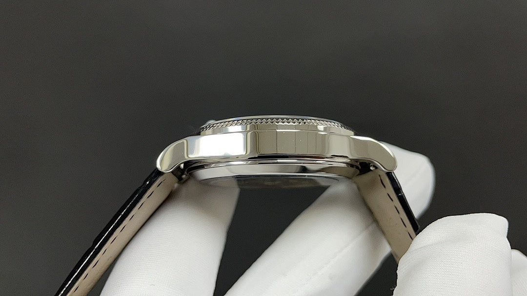 Wristwatch stainless steel case back with polished rim and textured edge detail