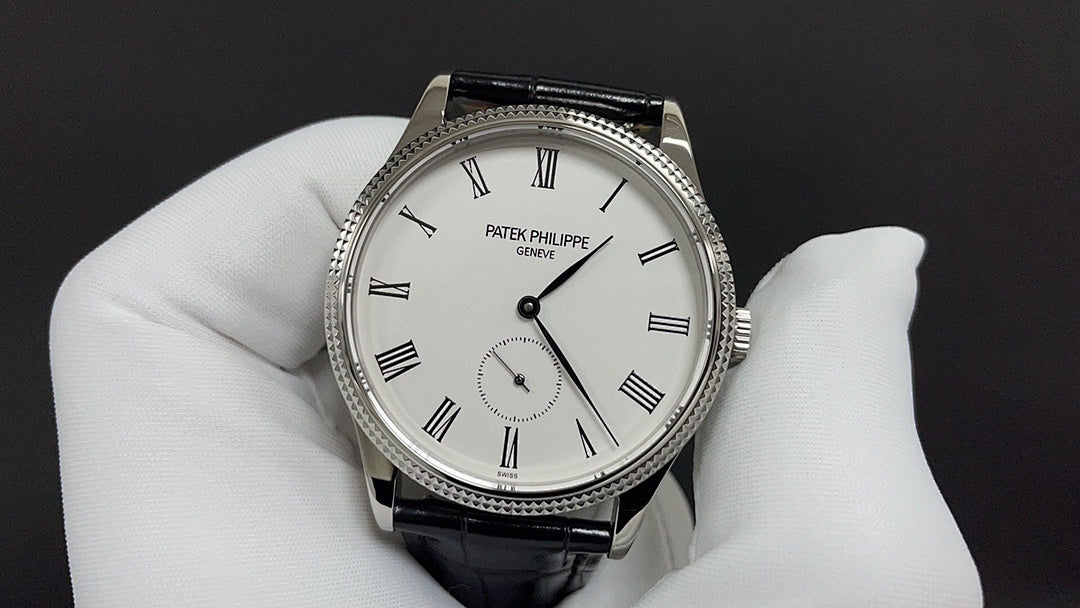 Wristwatch with white dial, Roman numerals, black leather strap, three-hand layout