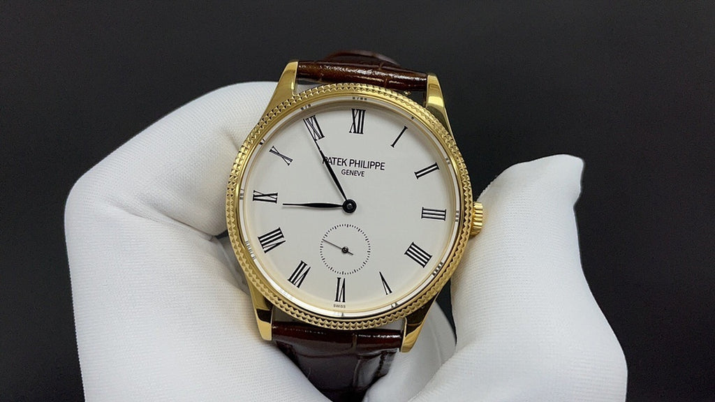 Patek Philippe watch front view, gold case, white dial with subdial, brown leather strap