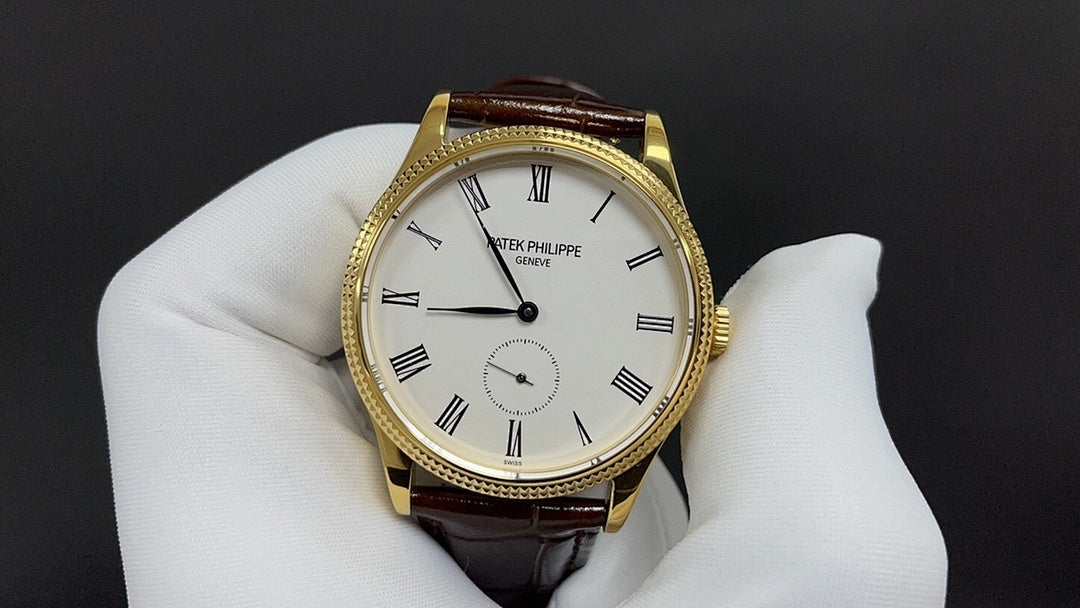 Patek Philippe watch front view, gold case, white dial with subdial, brown leather strap
