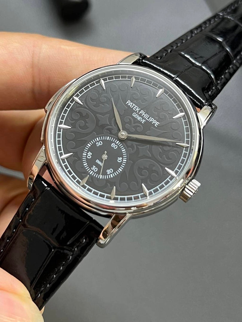 Patek Philippe wristwatch with black leather strap, dark gray dial and subdials