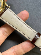 Patek Philippe watch strap, brown leather with pale stitching and gold tang