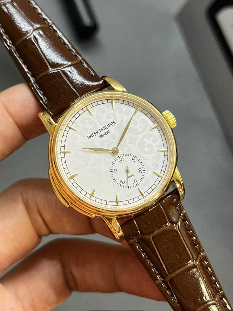 Patek Philippe watch angled view, brown leather strap, gold case, white dial