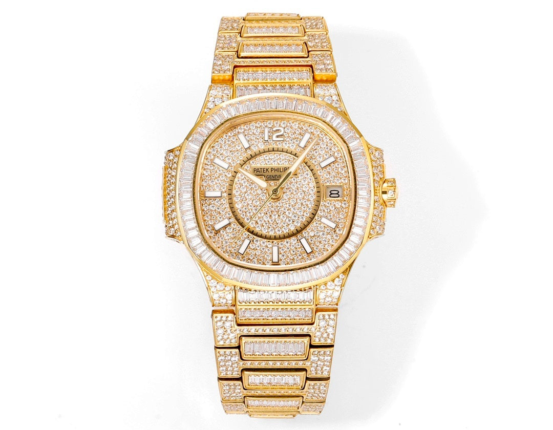Patek Philippe gold-tone wristwatch with diamond bezel, textured dial, and link bracelet
