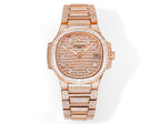 Patek Philippe diamond rose gold wristwatch with link bracelet and round dial